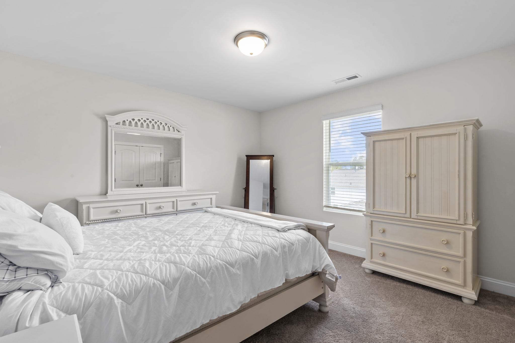 7329 Vanover Drive Raleigh, NC 27604 - Photo 17 of 30 Second Bedroom with All Furniture Available for Purchase