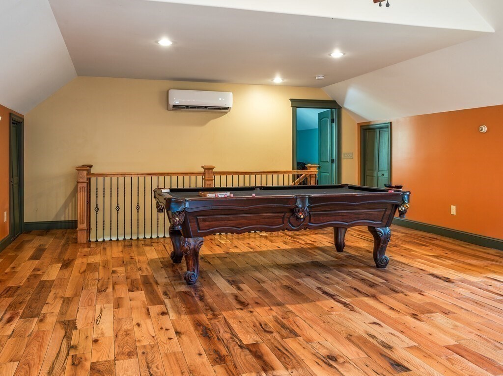 1082 Old Dana Road Barre, MA 01005 - Photo 20 of 42 a room with wooden floor pool table and windows