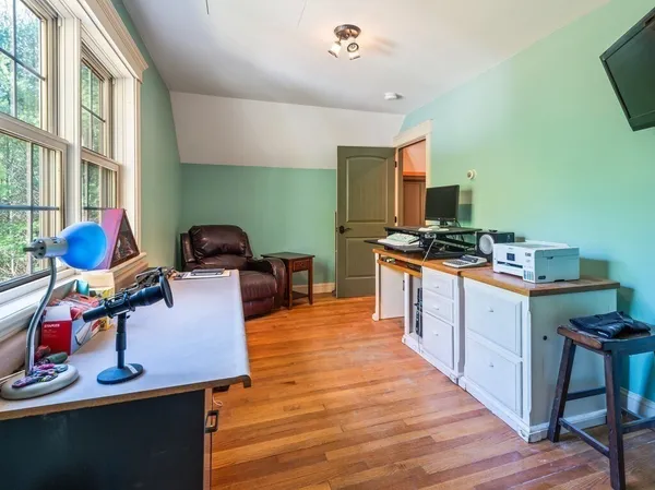 a kitchen with stainless steel appliances a stove top oven and a refrigerator