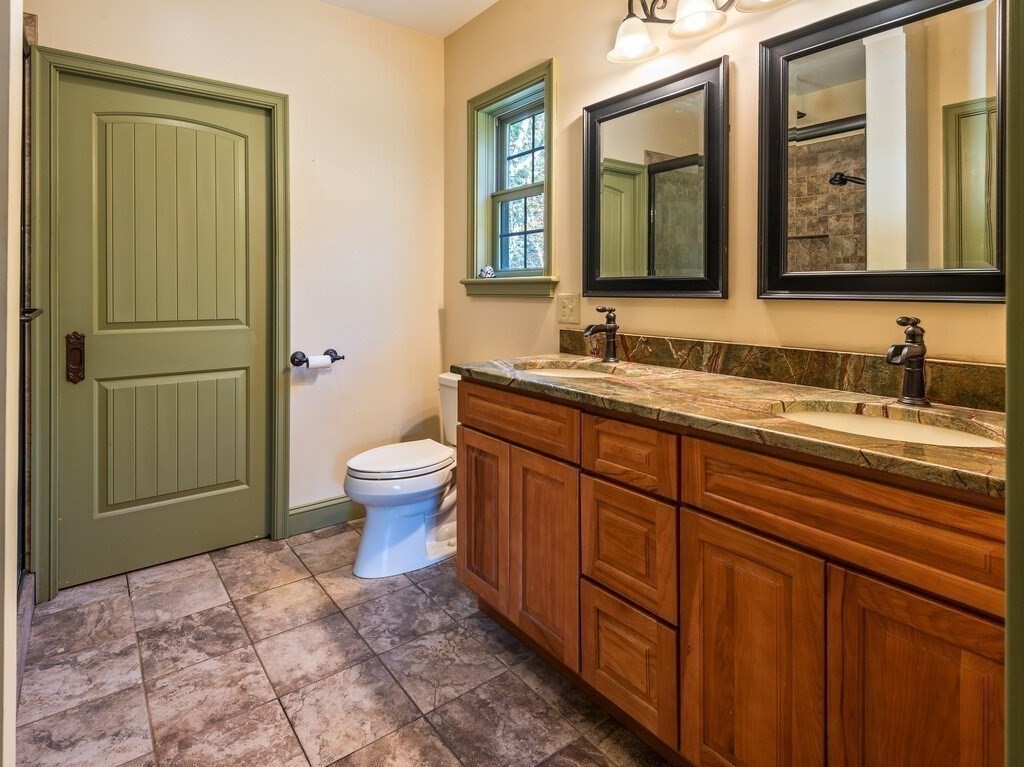 1082 Old Dana Road Barre, MA 01005 - Photo 26 of 42 a bathroom with a toilet sink and mirror