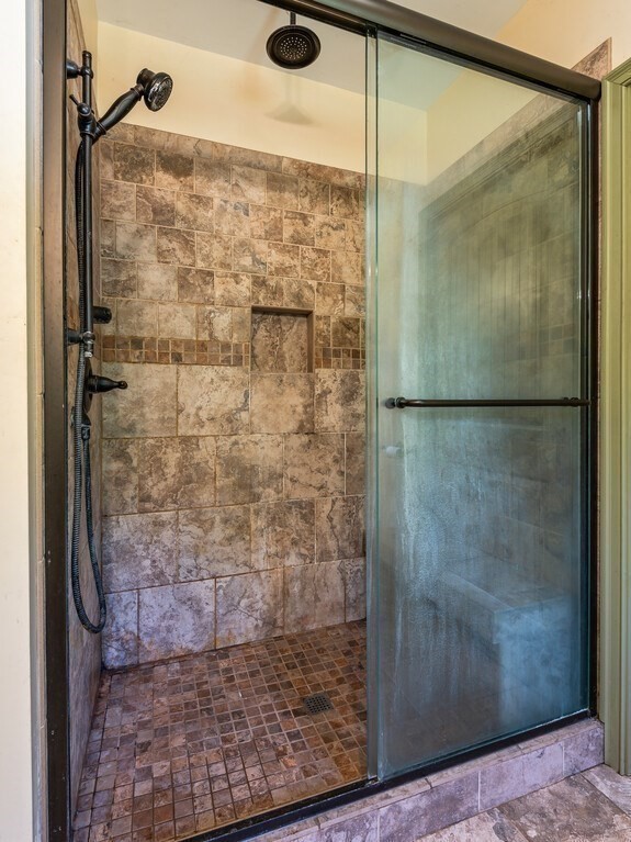 1082 Old Dana Road Barre, MA 01005 - Photo 27 of 42 a bathroom with a glass shower door