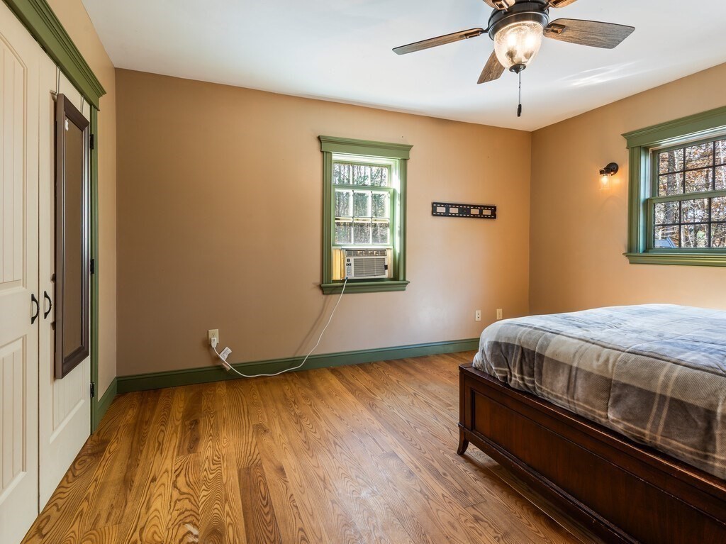 1082 Old Dana Road Barre, MA 01005 - Photo 29 of 42 a bedroom with bed and wooden floor