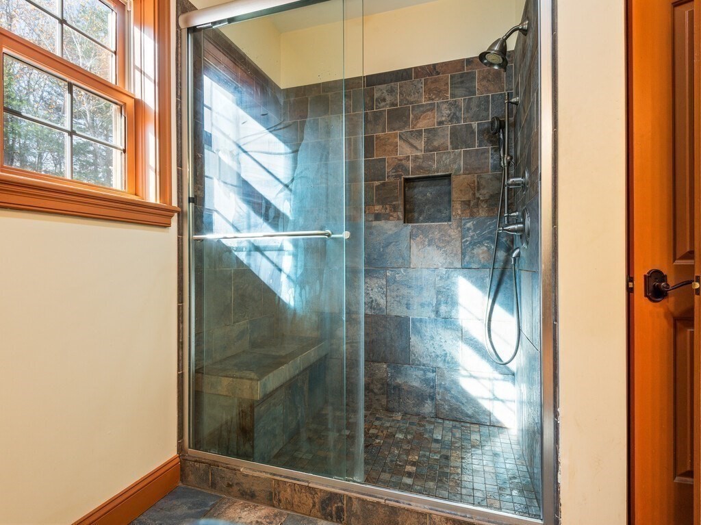 1082 Old Dana Road Barre, MA 01005 - Photo 31 of 42 a bathroom with a glass shower door