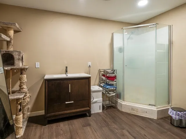 a room with a window and gym equipment