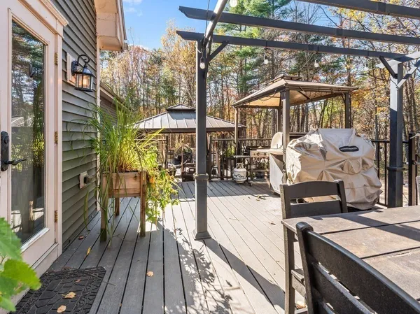 a view of a balcony with chairs