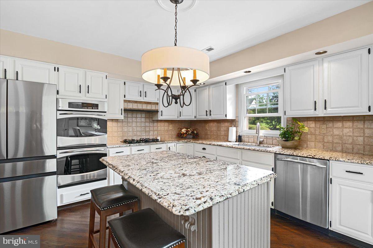 217 Windsor Way Doylestown, PA 18901 - Photo 15 of 36 Gas cooktop & double ovens