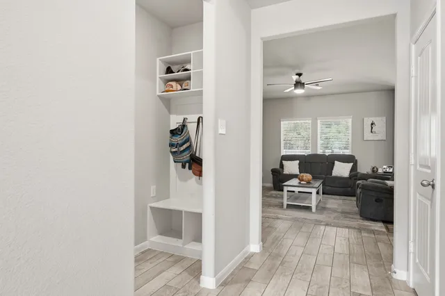 a living room with furniture and a table