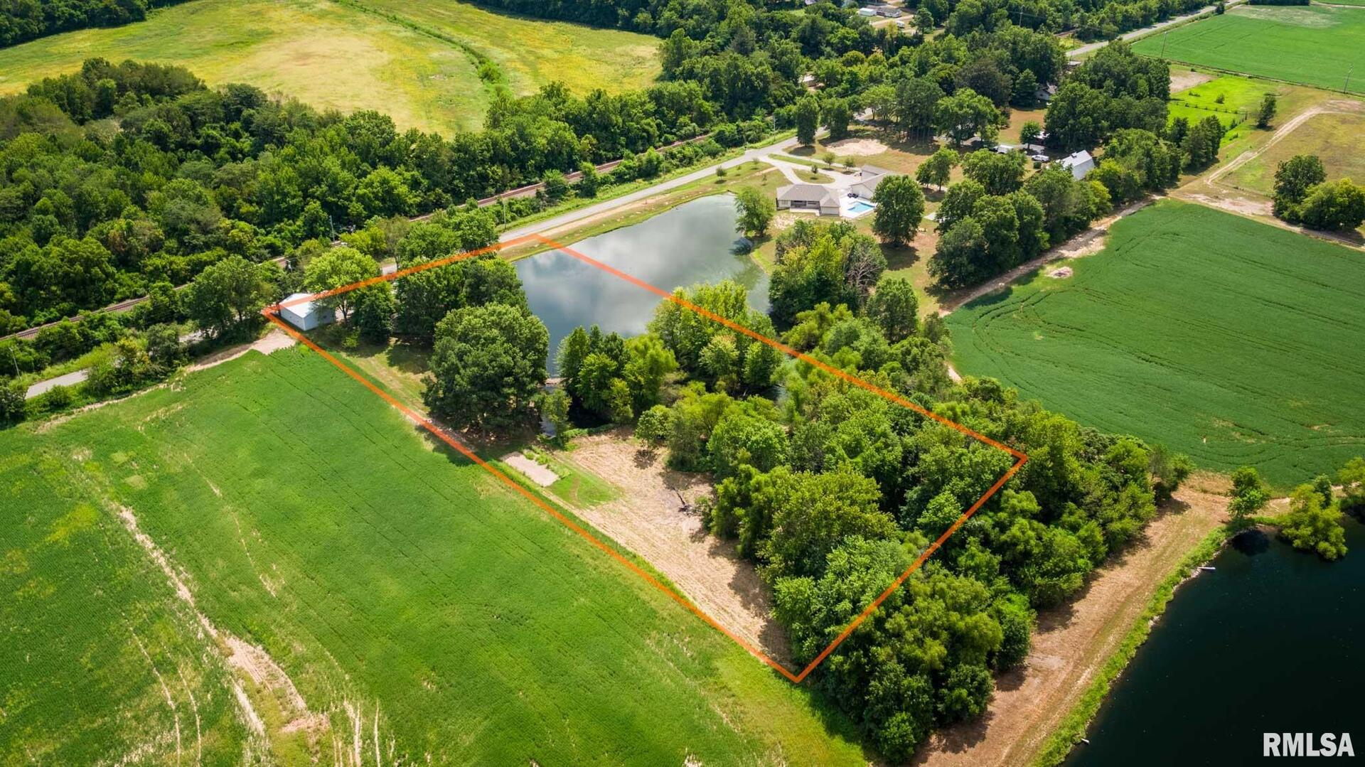 541 Dallas Road Murphysboro, IL 62966 - Photo 12 of 78 a view of a garden with a lake