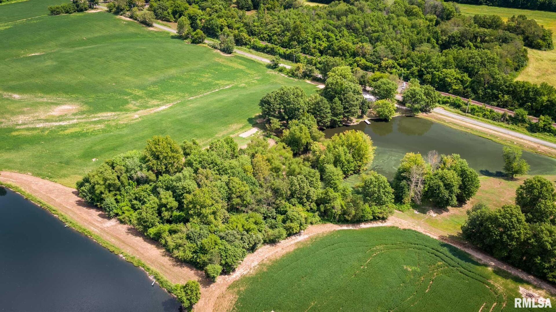 541 Dallas Road Murphysboro, IL 62966 - Photo 13 of 78 a view of a lake with a yard