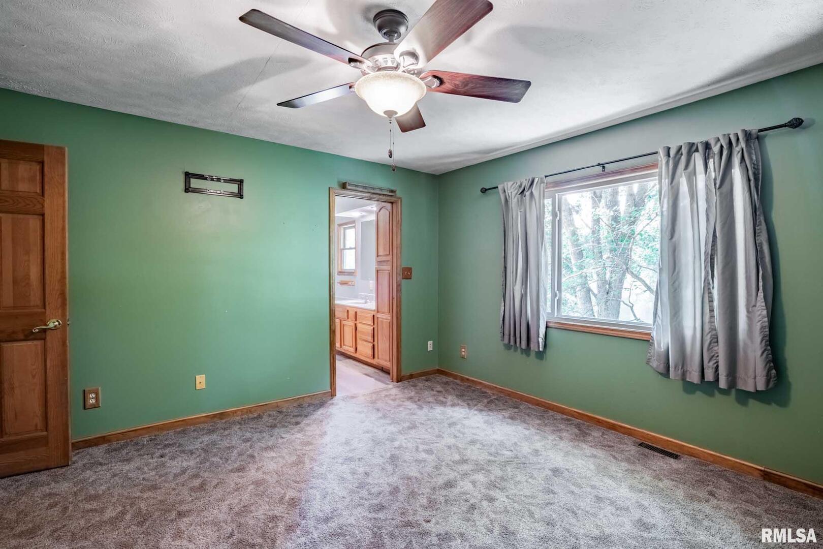 541 Dallas Road Murphysboro, IL 62966 - Photo 30 of 78 a view of a livingroom with an empty space and a window