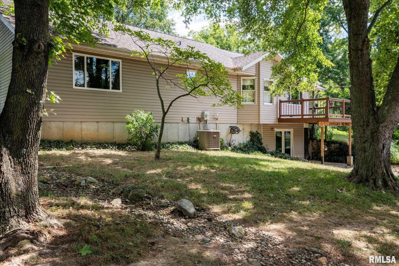 541 Dallas Road Murphysboro, IL 62966 - Photo 48 of 78 a view of a yard in front of a house with large tree