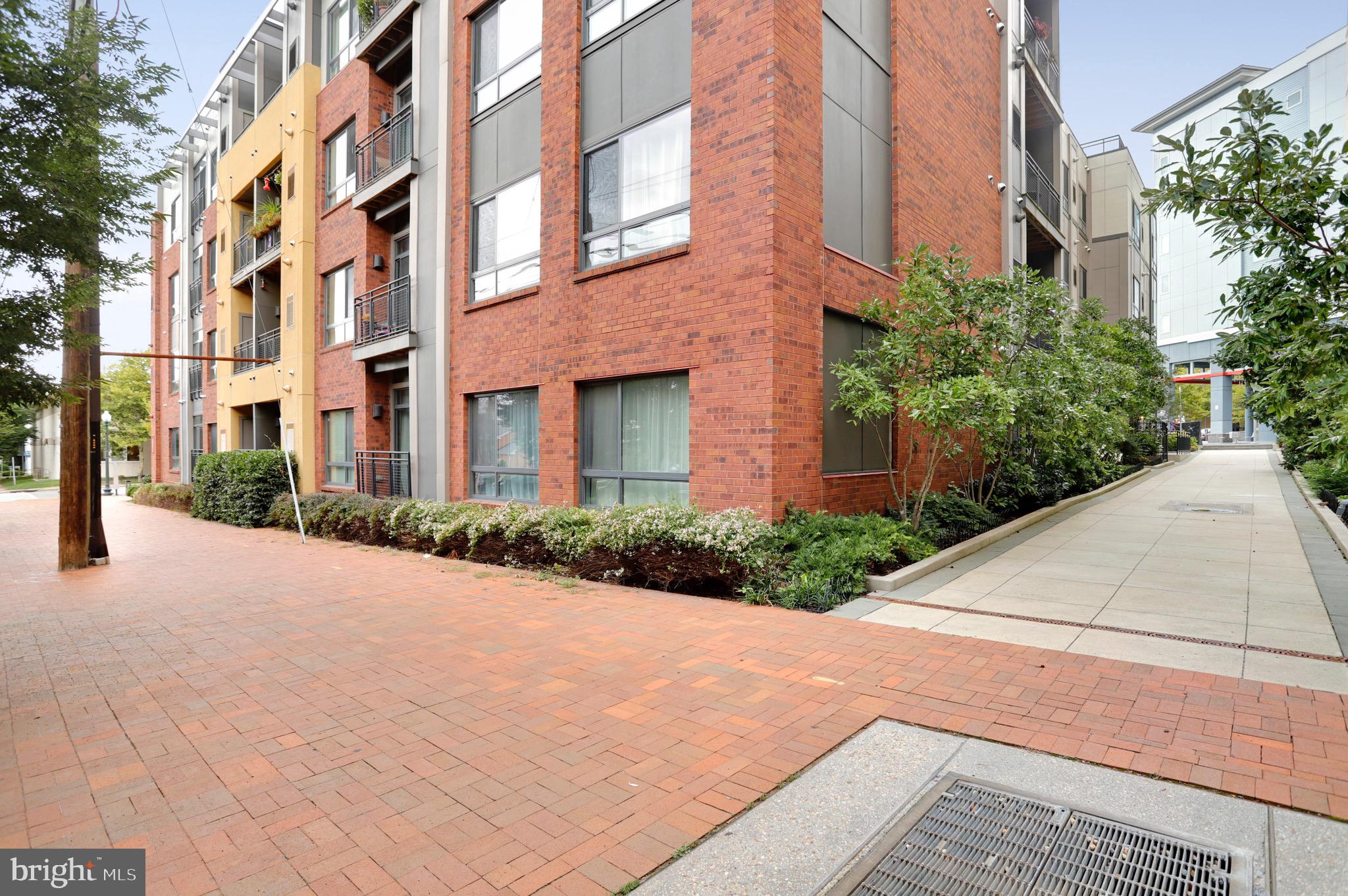 8005 13th Street, Unit 407 Silver Spring, MD 20910 - Photo 3 of 41 Brick sidewalks, well manicured landscaping
