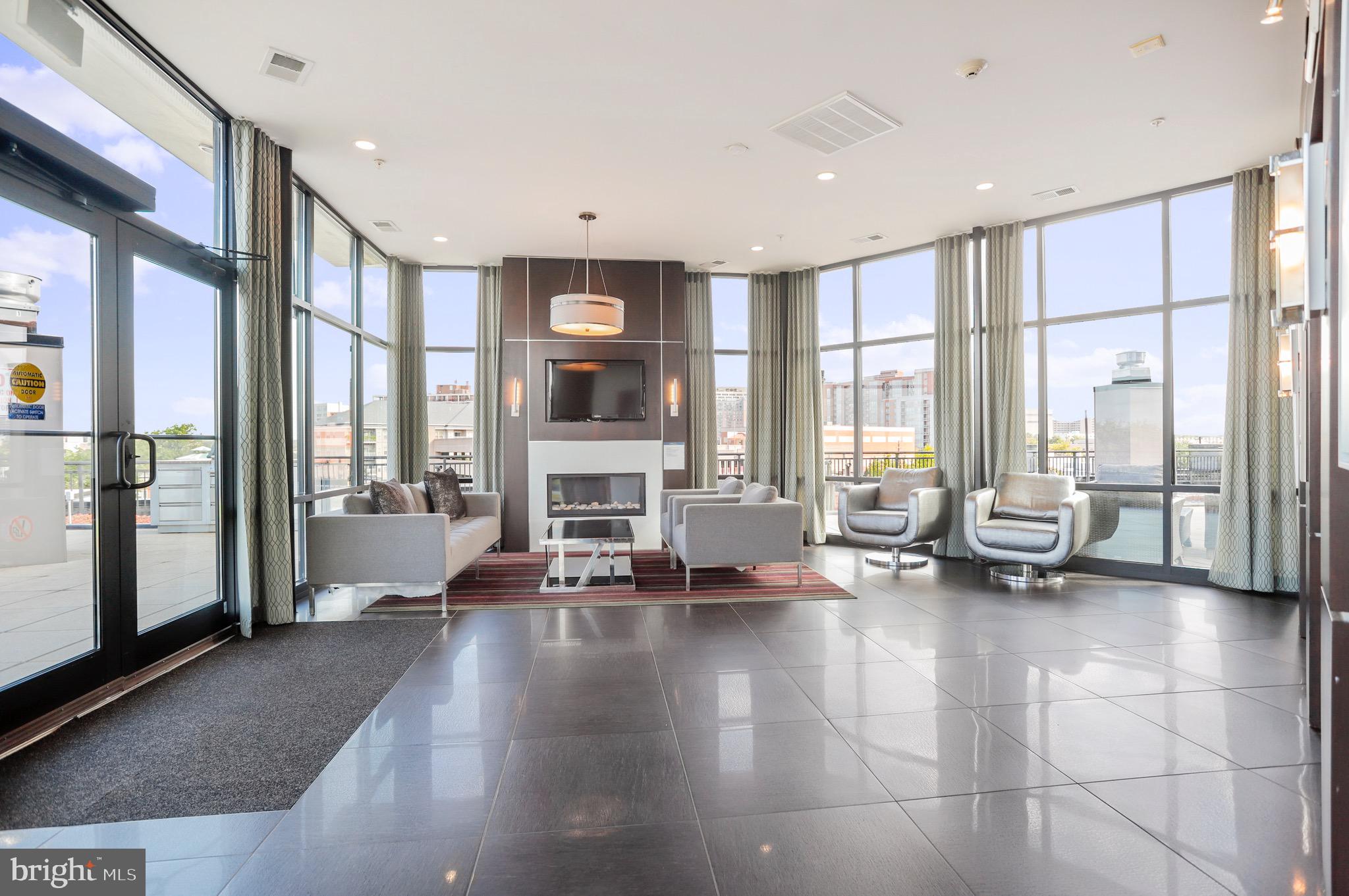 8005 13th Street, Unit 407 Silver Spring, MD 20910 - Photo 27 of 41 Roof top lounge its fireplace