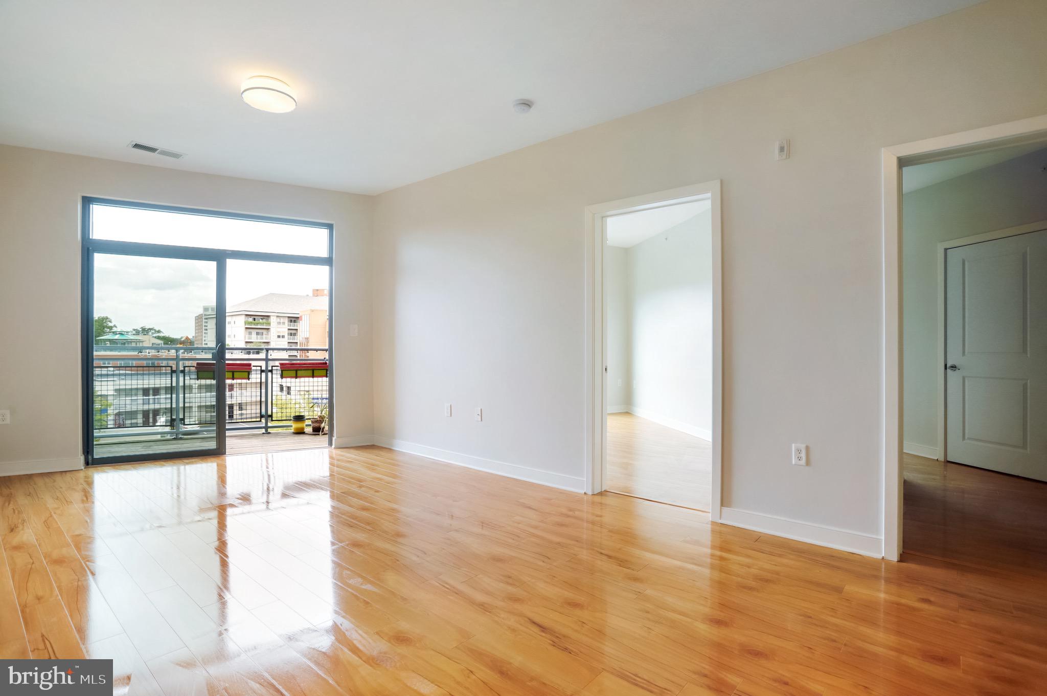 8005 13th Street, Unit 407 Silver Spring, MD 20910 - Photo 4 of 41 Living Room with balcony