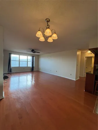 a view of a livingroom with wooden floor