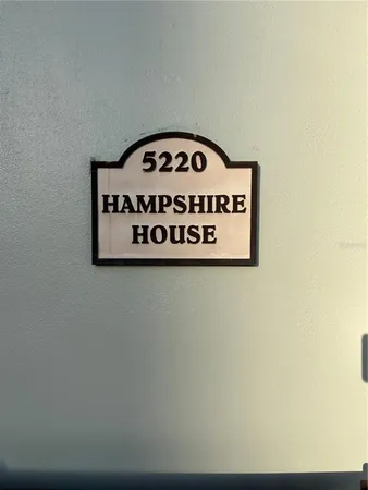 a wall with a sign on it