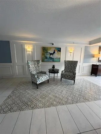 a living room with furniture and a couch