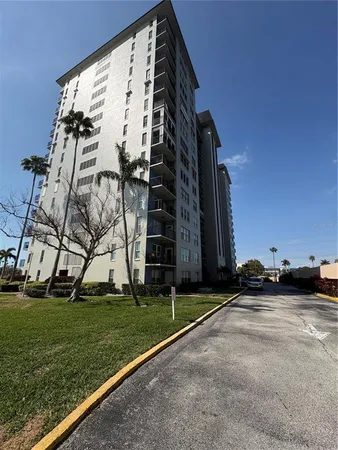a view of a park with a building