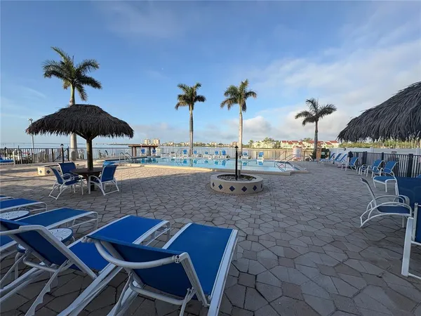 a view of a garden with chairs
