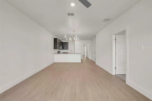 a view of kitchen with wooden floor