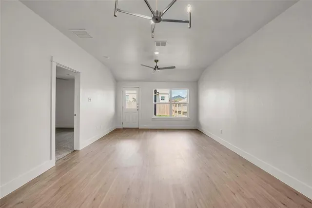 a view of a kitchen with a sink and a stove