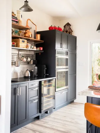 a kitchen with stainless steel appliances a cabinets and counter space