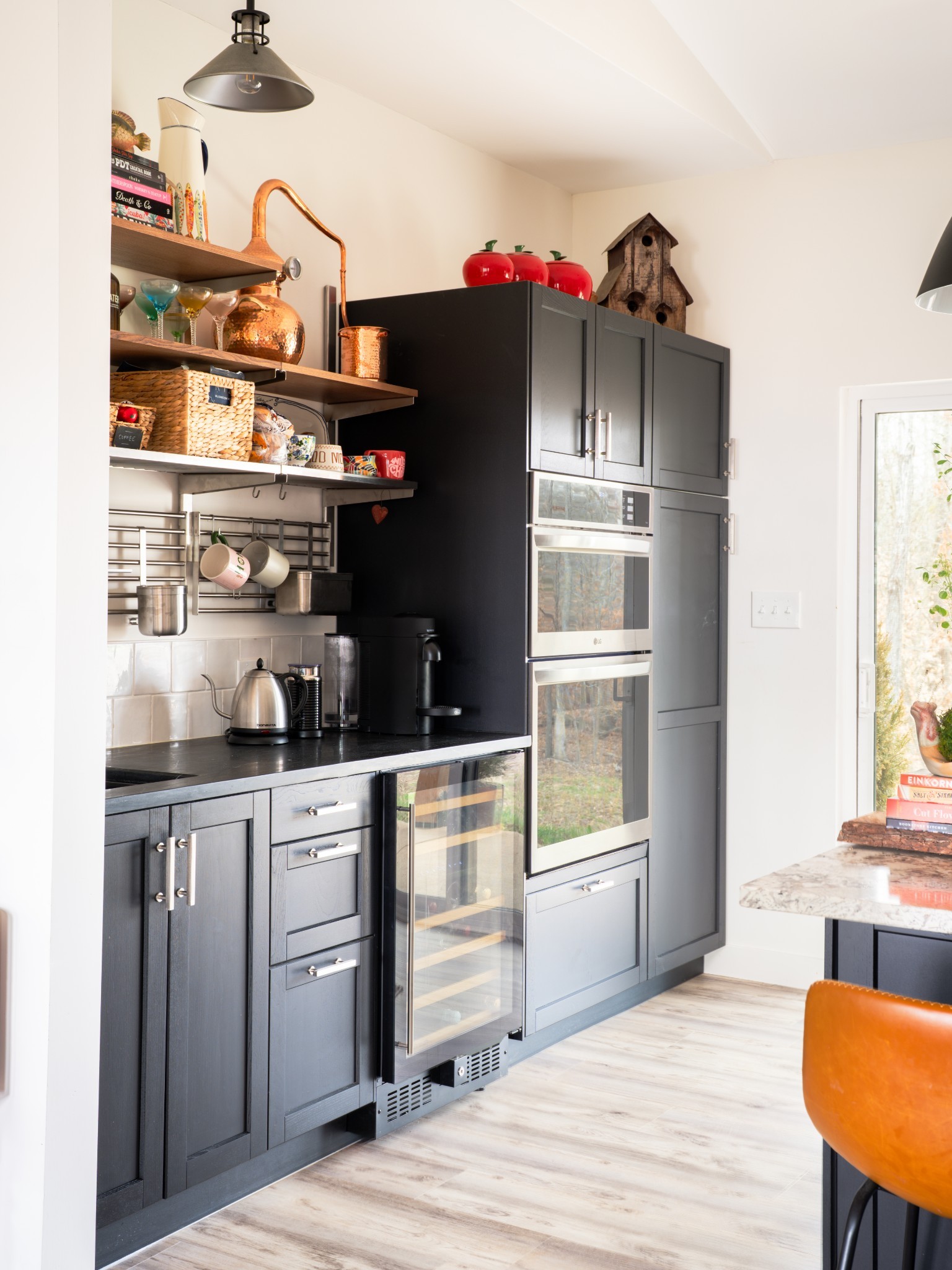 7050 Bakerville Road Waverly, TN 37185 - Photo 16 of 50 a kitchen with stainless steel appliances granite countertop a stove and cabinets