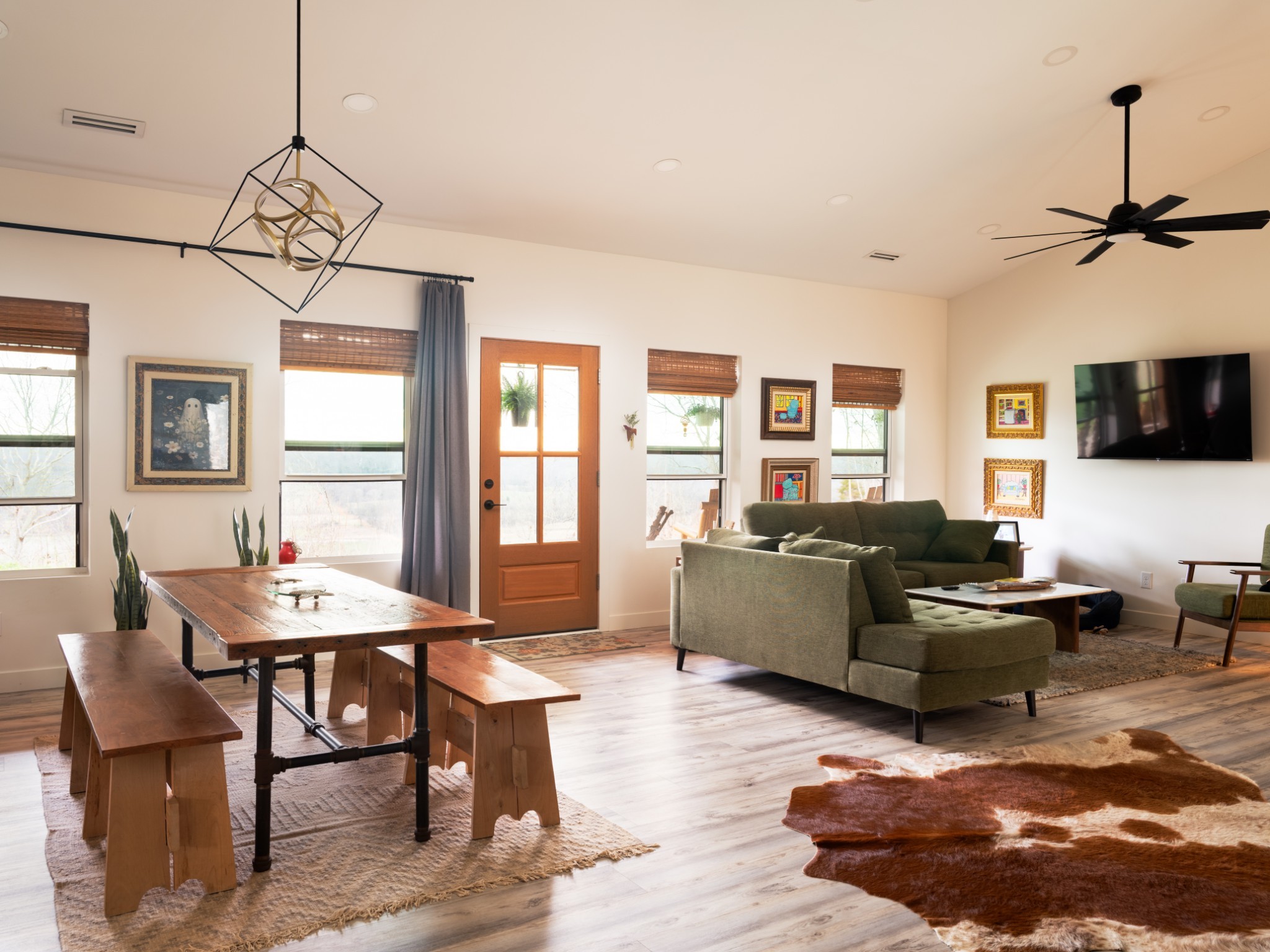 7050 Bakerville Road Waverly, TN 37185 - Photo 19 of 50 a living room with furniture a flat screen tv and a window