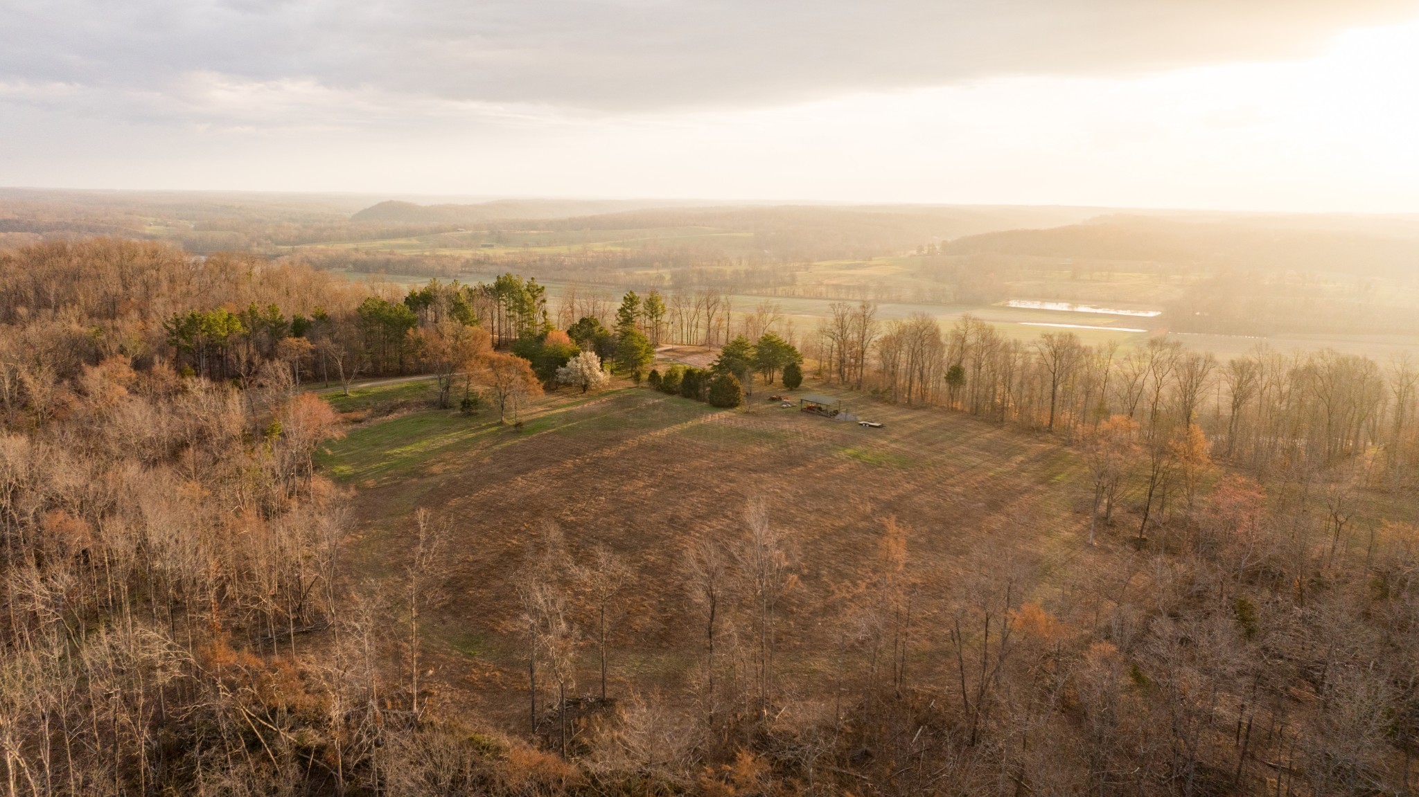 7050 Bakerville Road Waverly, TN 37185 - Photo 4 of 50 an aerial view of residential building and trees