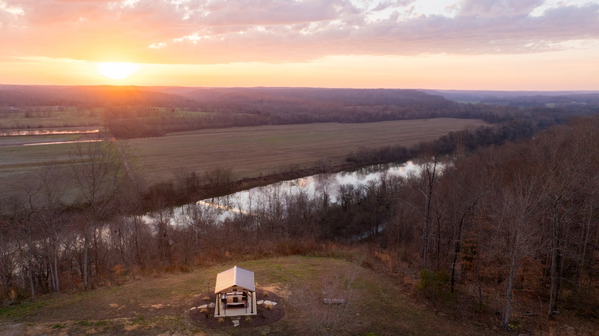 7050 Bakerville Road Waverly, TN 37185 - Photo 5 of 50 a view of a lake in middle of forest