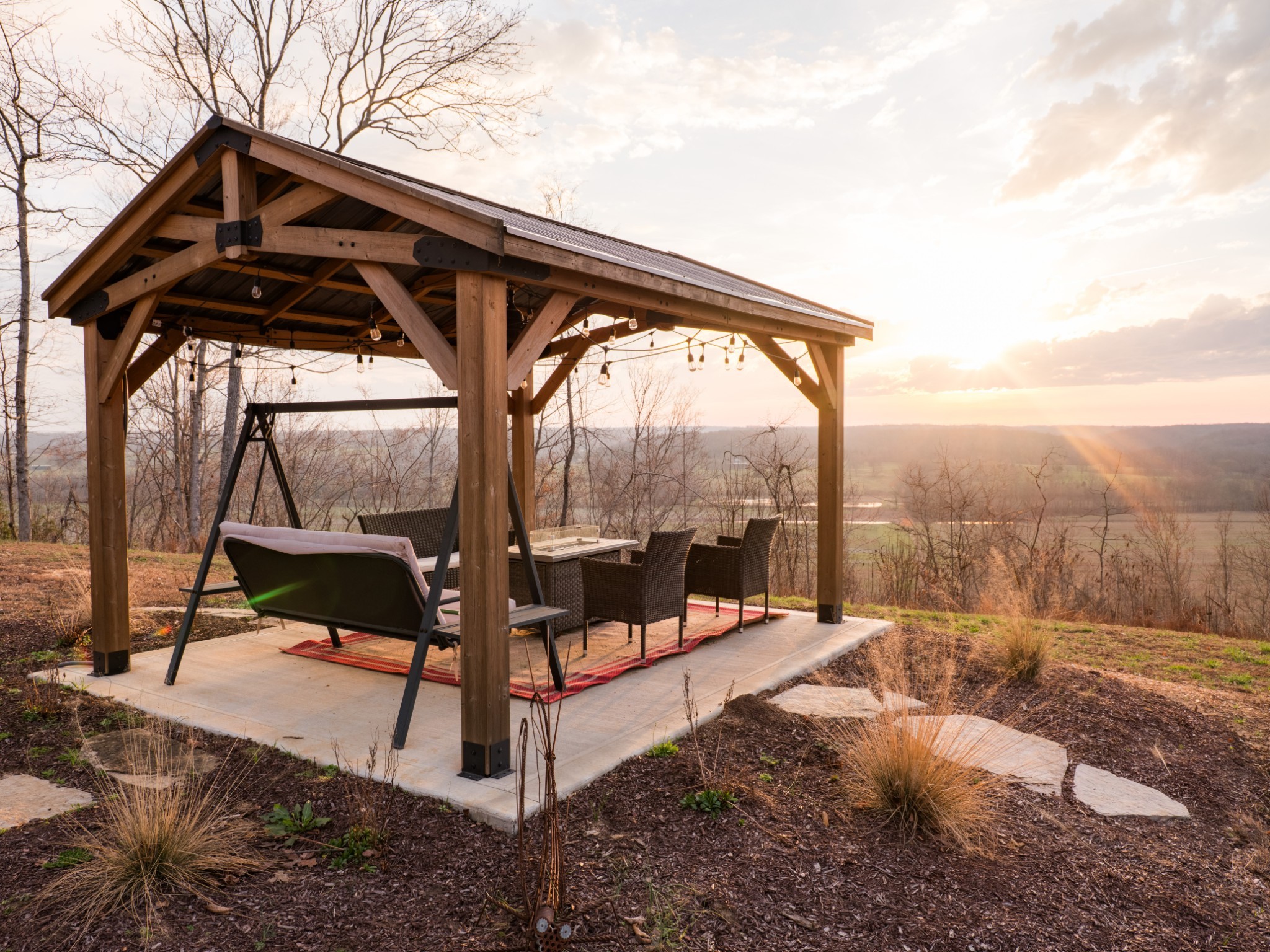 7050 Bakerville Road Waverly, TN 37185 - Photo 6 of 50 a backyard of a house with table and chairs