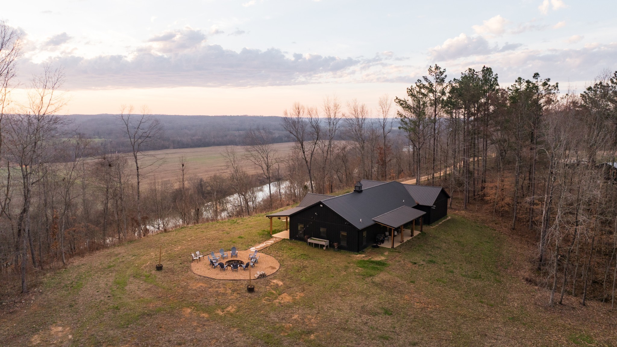 7050 Bakerville Road Waverly, TN 37185 - Photo 8 of 50 a view of a backyard with sitting area