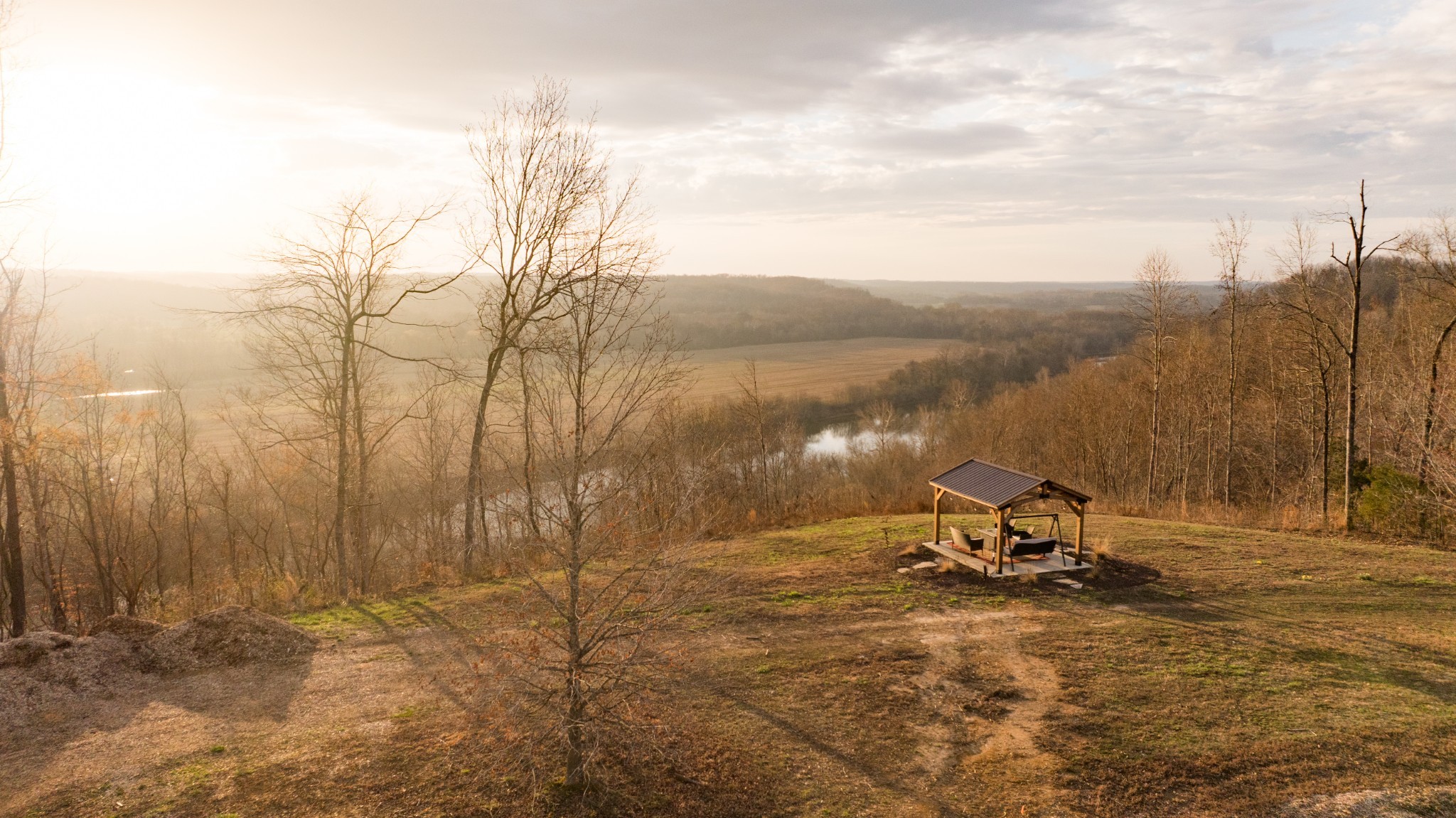 7050 Bakerville Road Waverly, TN 37185 - Photo 9 of 50 a view of a lake with a mountain