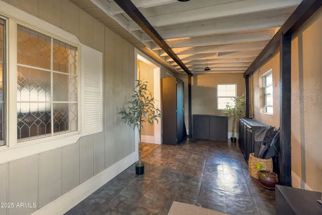 a view of livingroom with furniture and windows