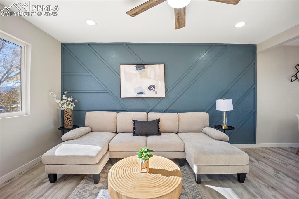 2010 Hampton South Colorado Springs, CO 80906 - Photo 12 of 45 a living room with furniture and a large window