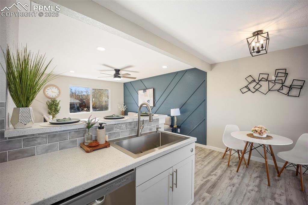 2010 Hampton South Colorado Springs, CO 80906 - Photo 18 of 45 a view of a kitchen with a table and chairs