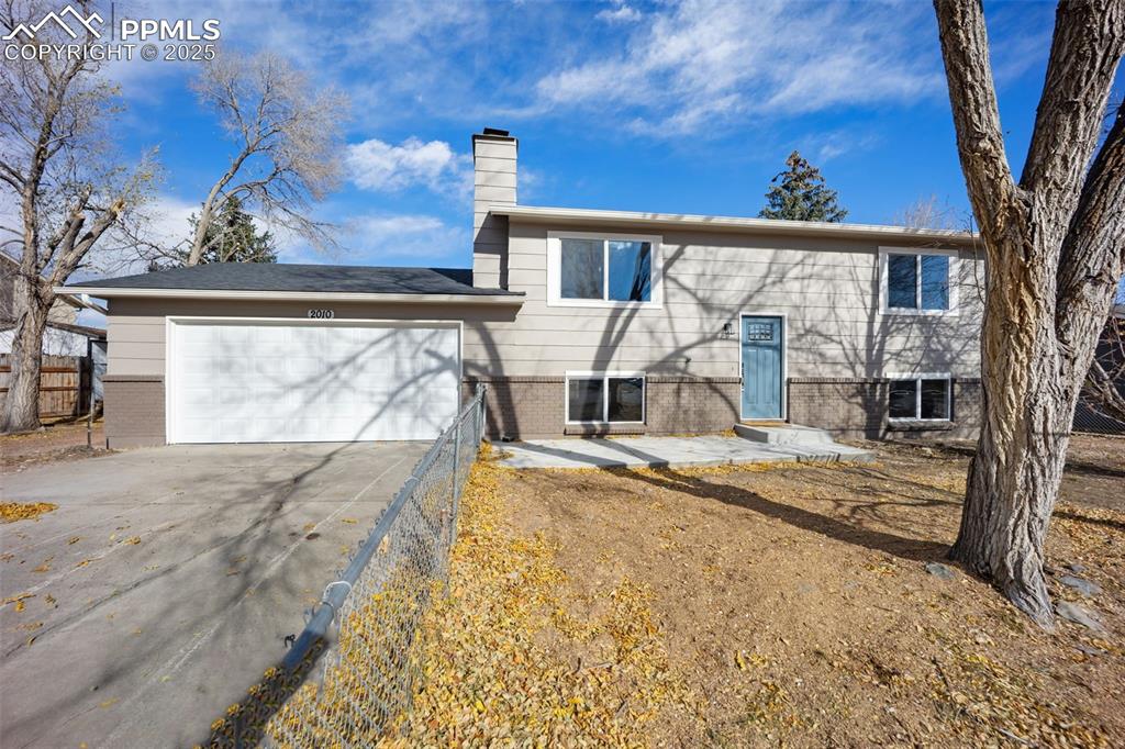 2010 Hampton South Colorado Springs, CO 80906 - Photo 4 of 45 a view of a house with a snow on the road
