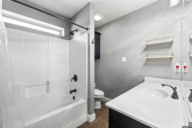 a view of a house with pool and a yard