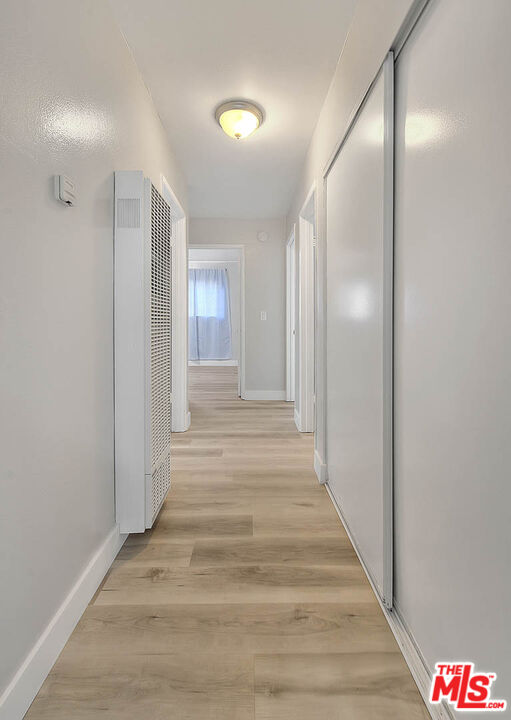 4822 Hollow Corner Road, Unit 177 Culver City, CA 90230 - Photo 18 of 39 a view of a hallway with wooden floor