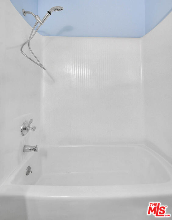 4822 Hollow Corner Road, Unit 177 Culver City, CA 90230 - Photo 22 of 39 a bathroom with a bathtub and shower