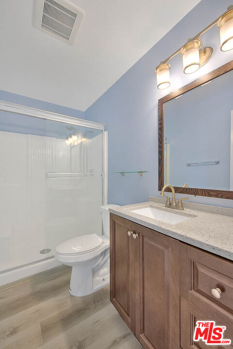 4822 Hollow Corner Road, Unit 177 Culver City, CA 90230 - Photo 26 of 39 a bathroom with a sink and a toilet