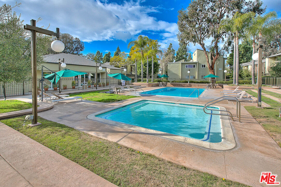 4822 Hollow Corner Road, Unit 177 Culver City, CA 90230 - Photo 31 of 39 a view of a house with swimming pool and porch