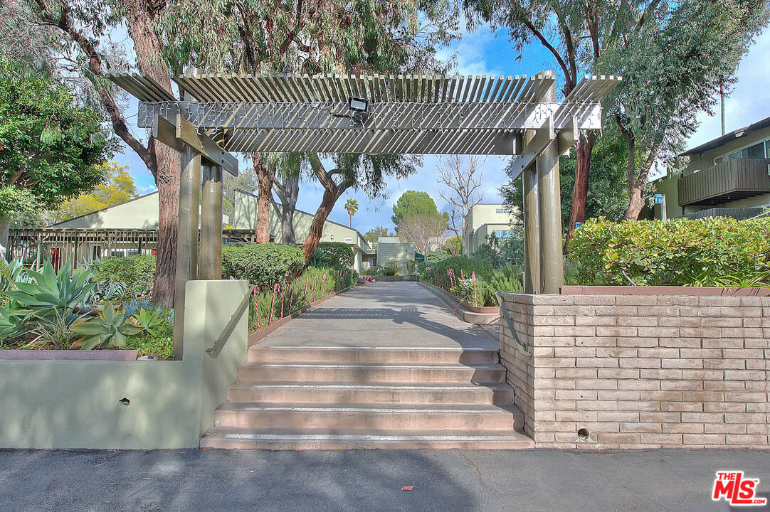 4822 Hollow Corner Road, Unit 177 Culver City, CA 90230 - Photo 36 of 39 a front view of a house with garden