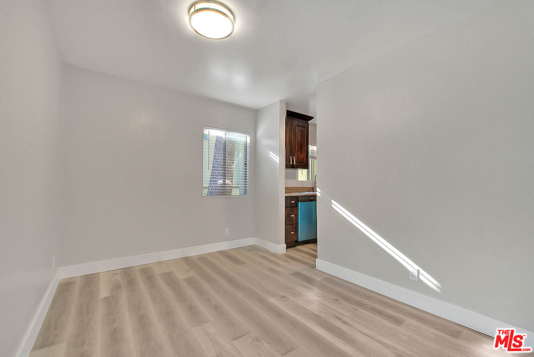 4822 Hollow Corner Road, Unit 177 Culver City, CA 90230 - Photo 8 of 39 a view of empty room with wooden floor