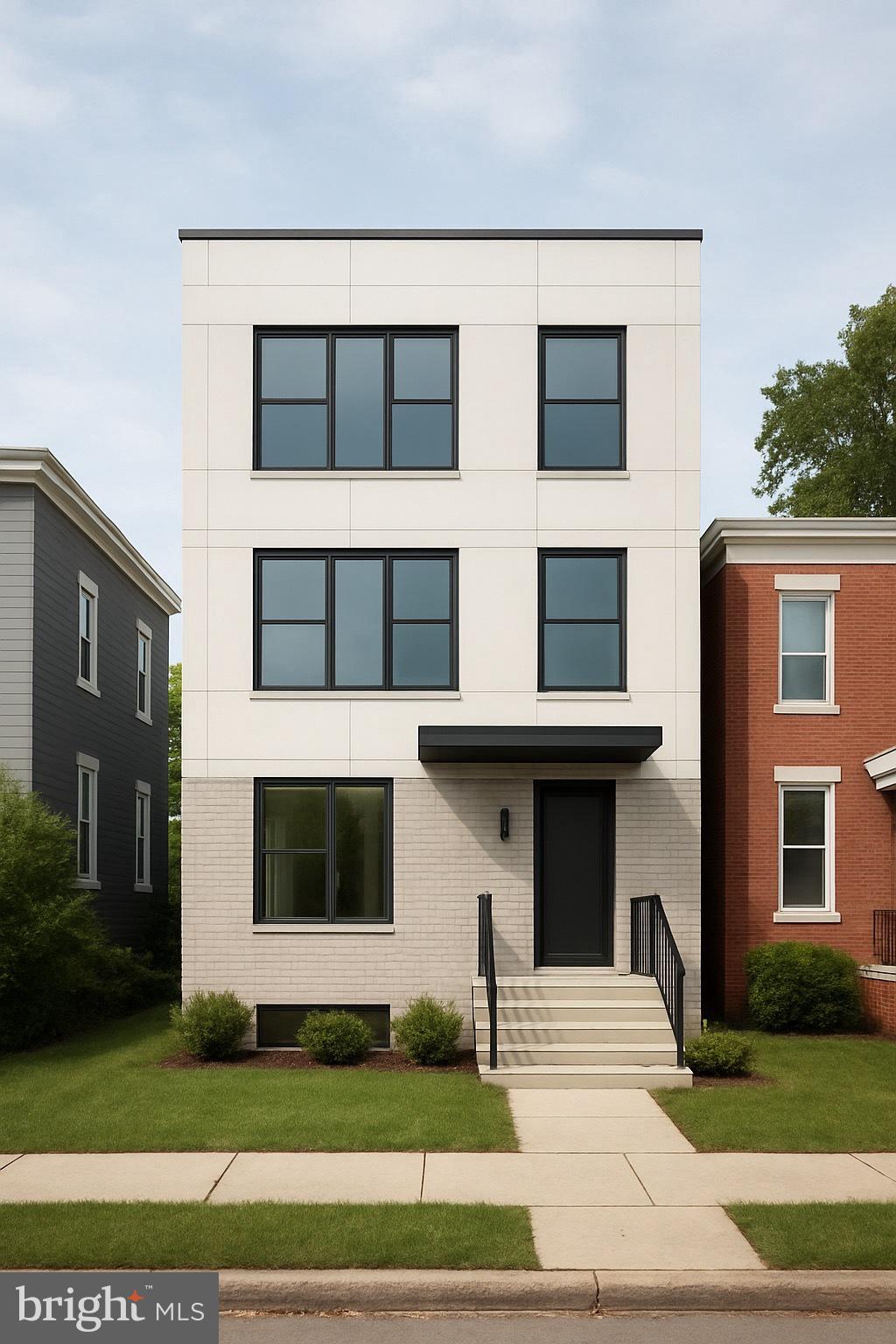 2307 North 21st Street Philadelphia, PA 19132 - Photo 2 of 4 a front view of a house with a yard