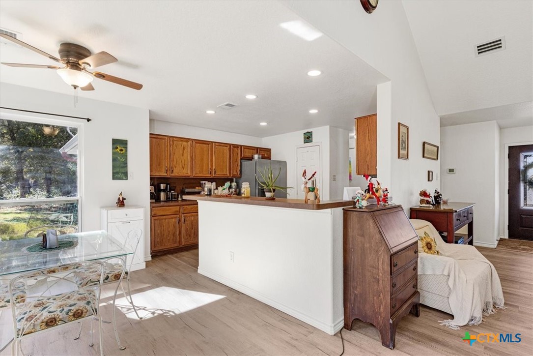 110 Sky Ranch Road Smithville, TX 78957 - Photo 13 of 31 a living room with furniture and kitchen view