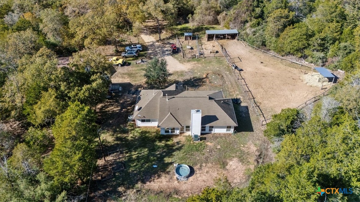 110 Sky Ranch Road Smithville, TX 78957 - Photo 29 of 31 an aerial view of a house with a yard