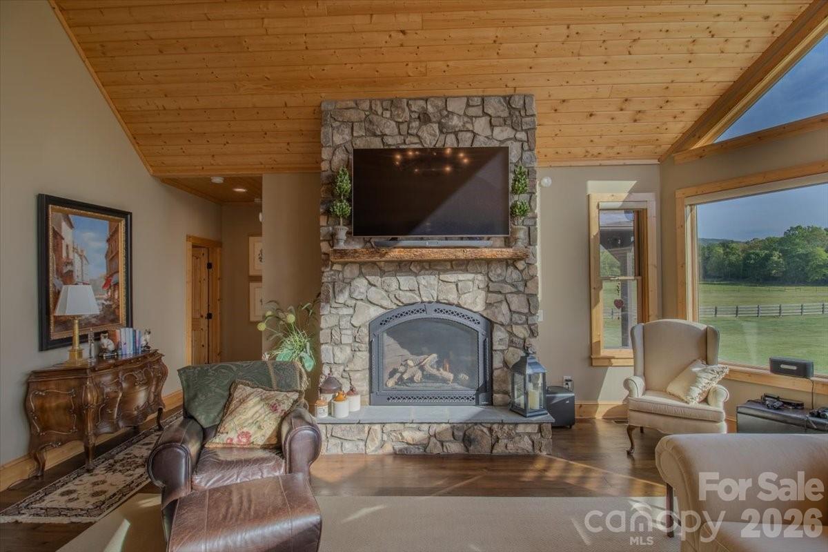 1083 Union Community Road Thurmond, NC 28683 - Photo 11 of 47 a living room with furniture and a fireplace