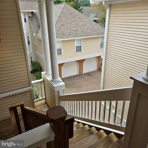 a view of balcony with furniture