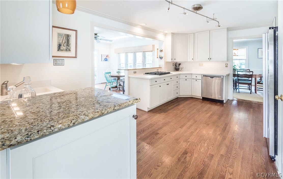 108 Ralston Road Henrico, VA 23229 - Photo 11 of 42 a large white kitchen with cabinets and wooden floor